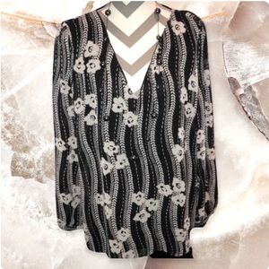 Beautiful Blouse with floral detail